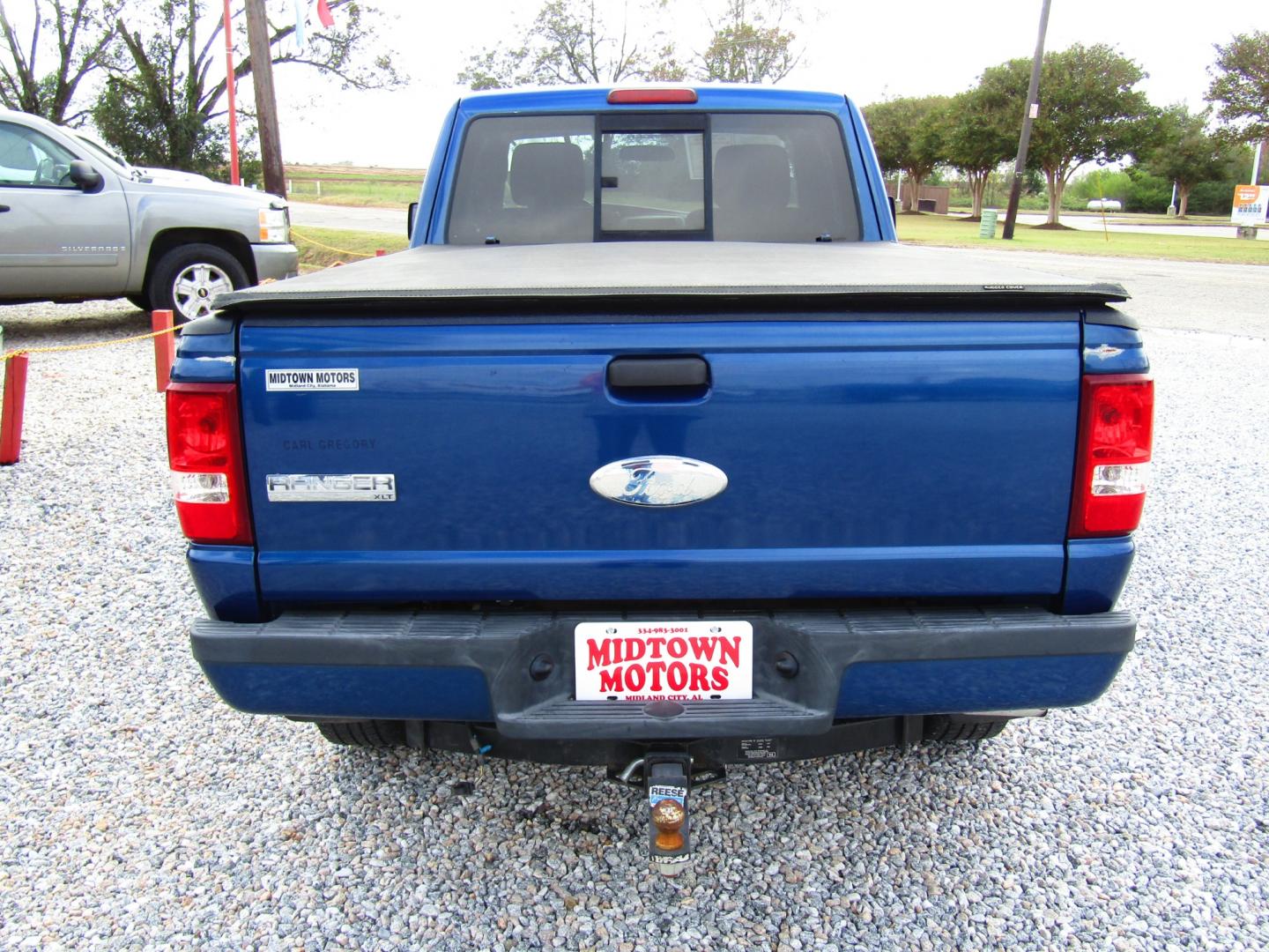 2010 Blue /Black Ford Ranger Sport SuperCab 4-Door 4WD (1FTLR4FE6AP) with an 4.0L V6 SOHC 12V engine, Automatic transmission, located at 15016 S Hwy 231, Midland City, AL, 36350, (334) 983-3001, 31.306210, -85.495277 - Photo#6